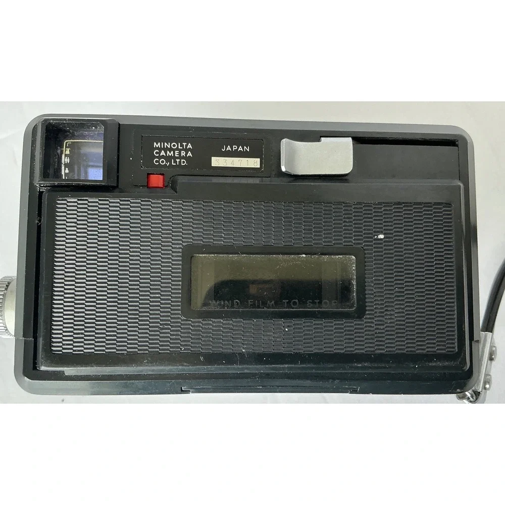 Minolta Vintage Autopak 500 Film Camera Rokkor 38mm f/2.8 Lens Silver Black Retr